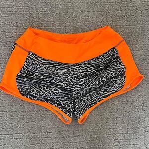 Nike Womens shorts sz s small running orange black/white print